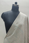 Handloom striped cotton fabric.