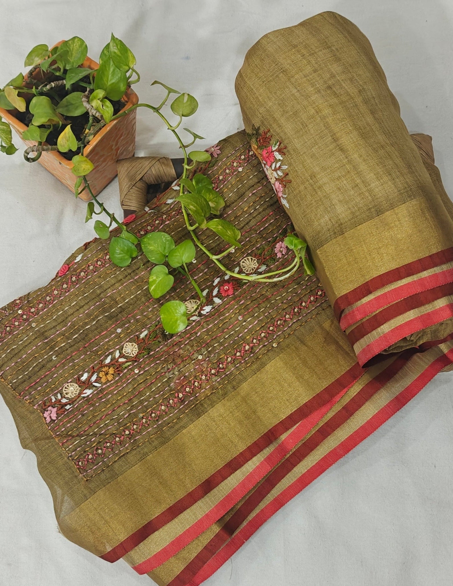 Hand Embroidered Linen Tissue Saree.